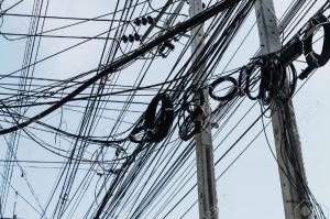 50818180-Electrical-cables-with-telephone-lines-tangled-messy-in-Bangkok-city-Thailand-Stock-Photo